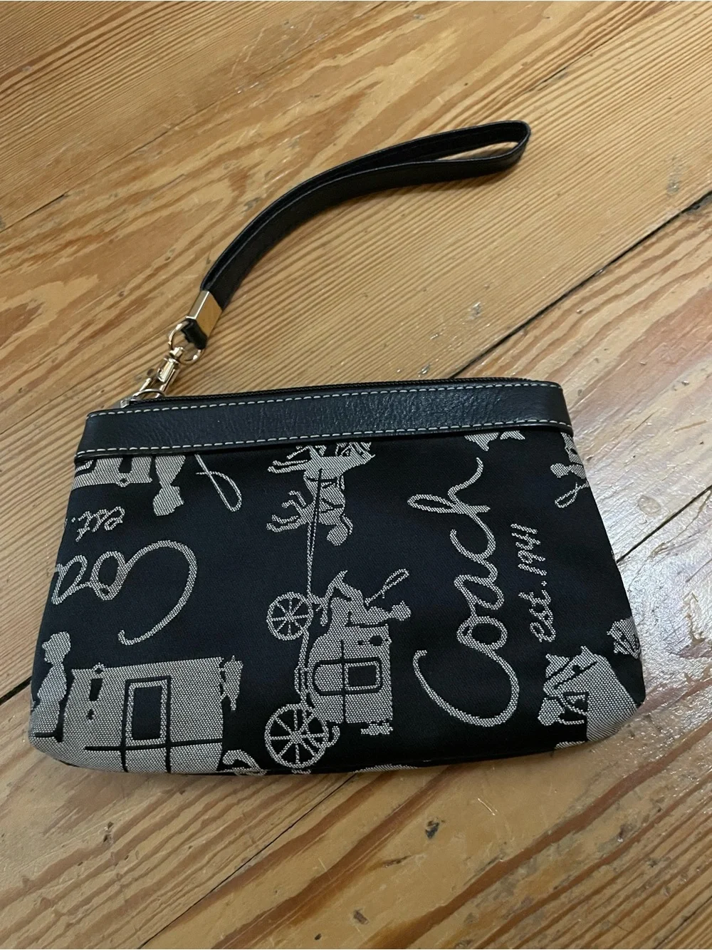 Coach Black Wristlet with Silver Carriage Print